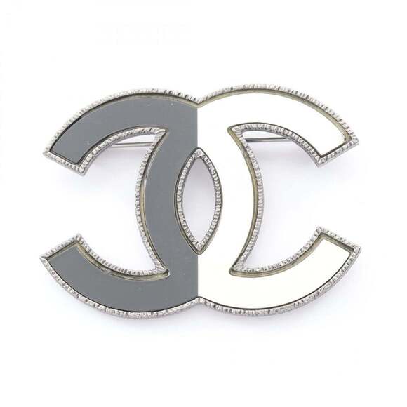CHANEL Jewelry - CHANEL Black Logo Brooch